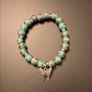 Hand Crafted Turquoise and Pink Beaded Bracelet with Butterfly Charm